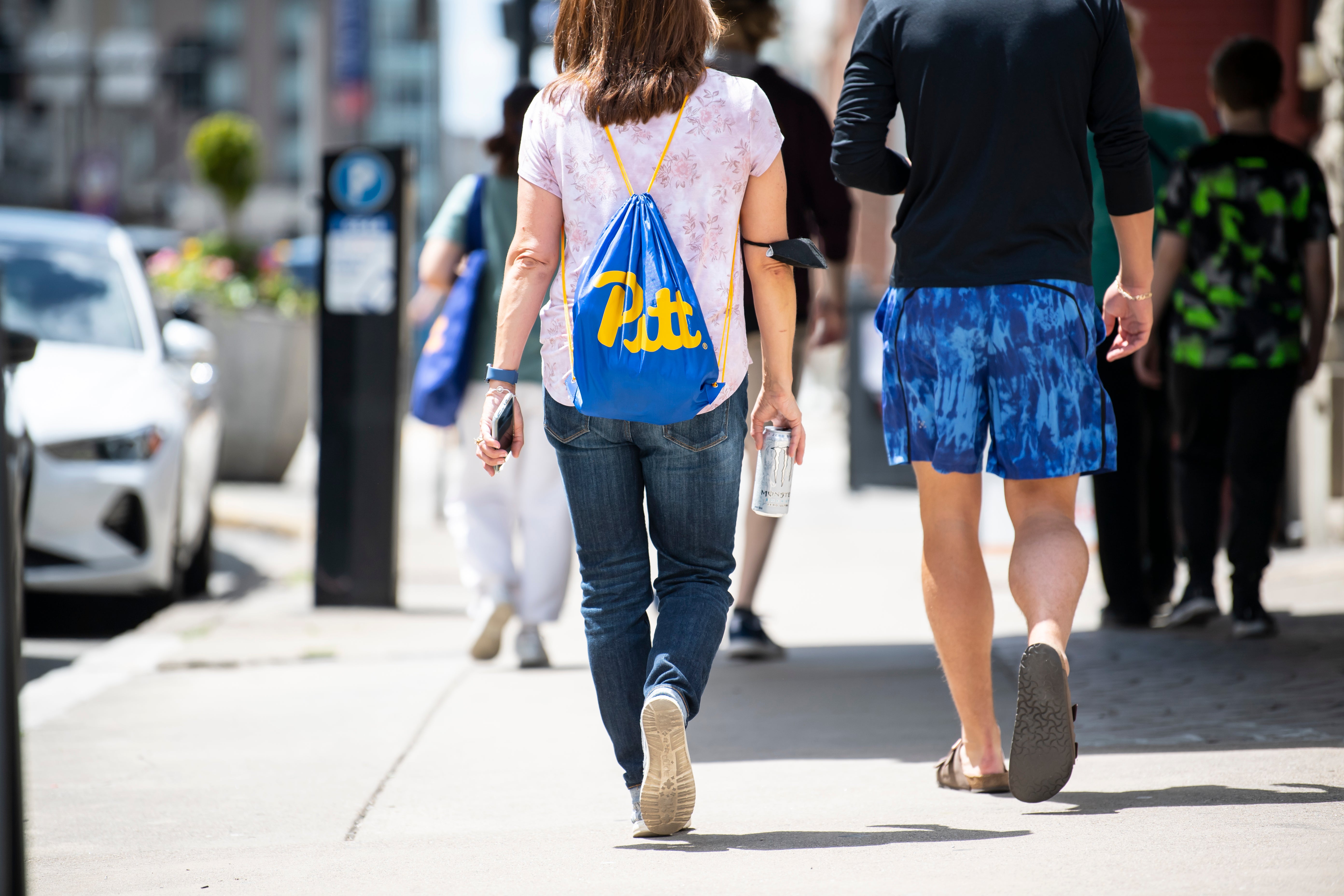 Pitt students walking in Oakland.
